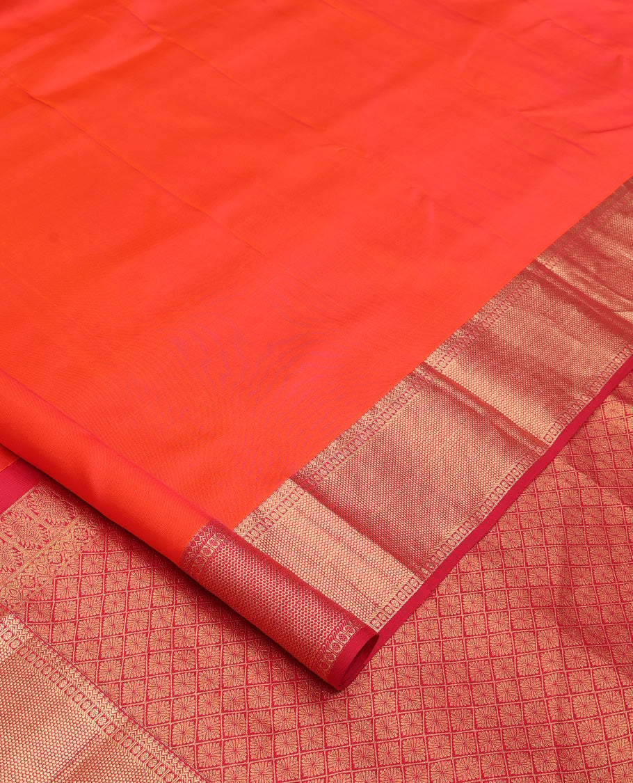 Orange plain Kanchipuram silk saree, contrast border of thilakam, banaras, kuyil kann, and rudraksham designs, and jaal pallu