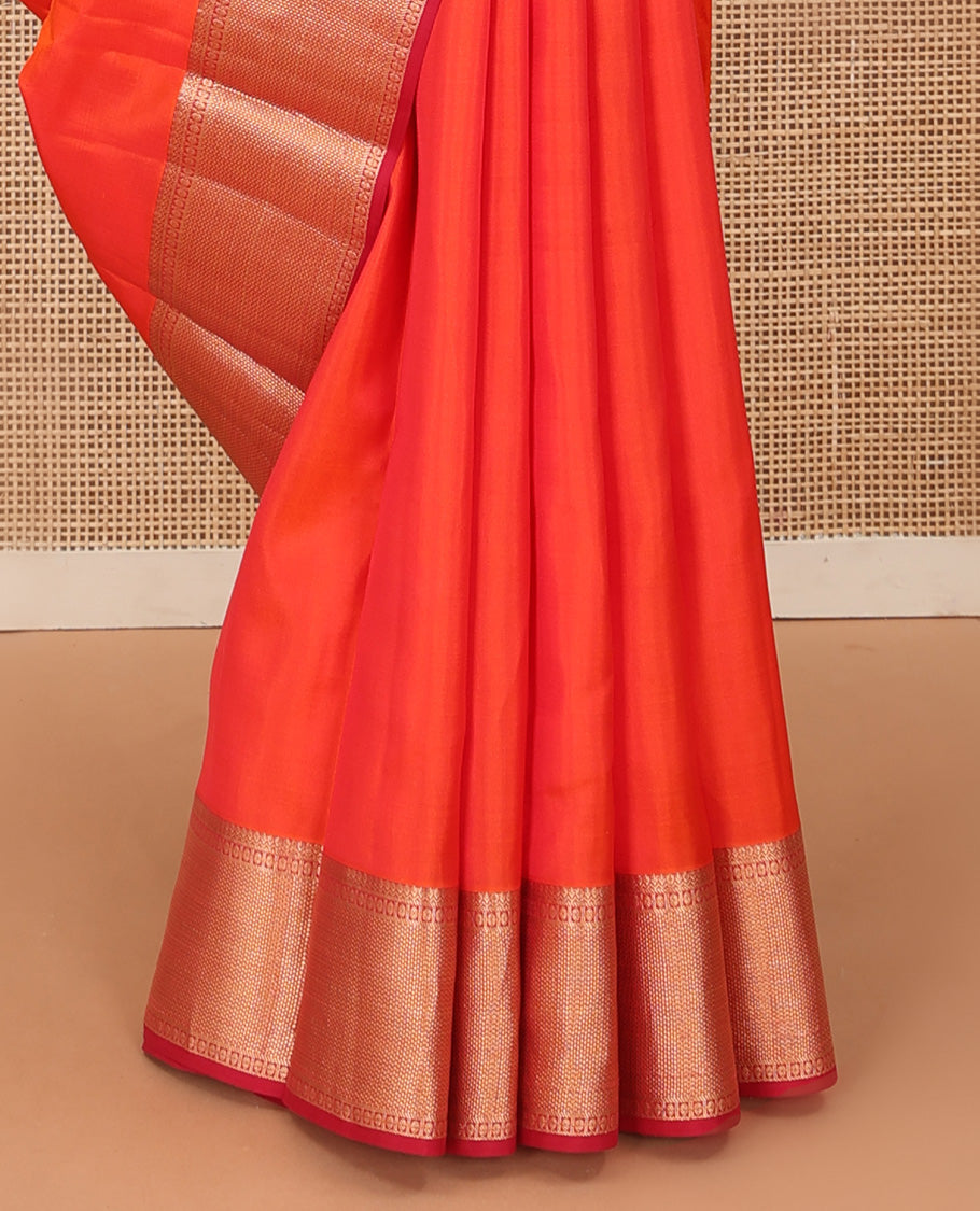 Orange plain Kanchipuram silk saree, contrast border of thilakam, banaras, kuyil kann, and rudraksham designs, and jaal pallu