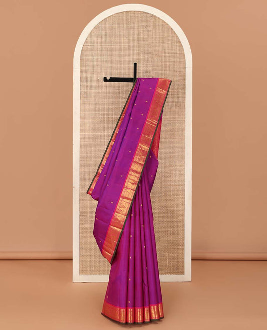 Purple Kanchipuram Silk Saree, Beautified with Kamalam Zari Buttas on Its Body, Complemented by Contrast Border of Rekku, Muthu, Mayil Kann, Mayil, and Vanki Designs, Pallu of Butta Enclosed Checks, and Paired with a Contrast Blouse