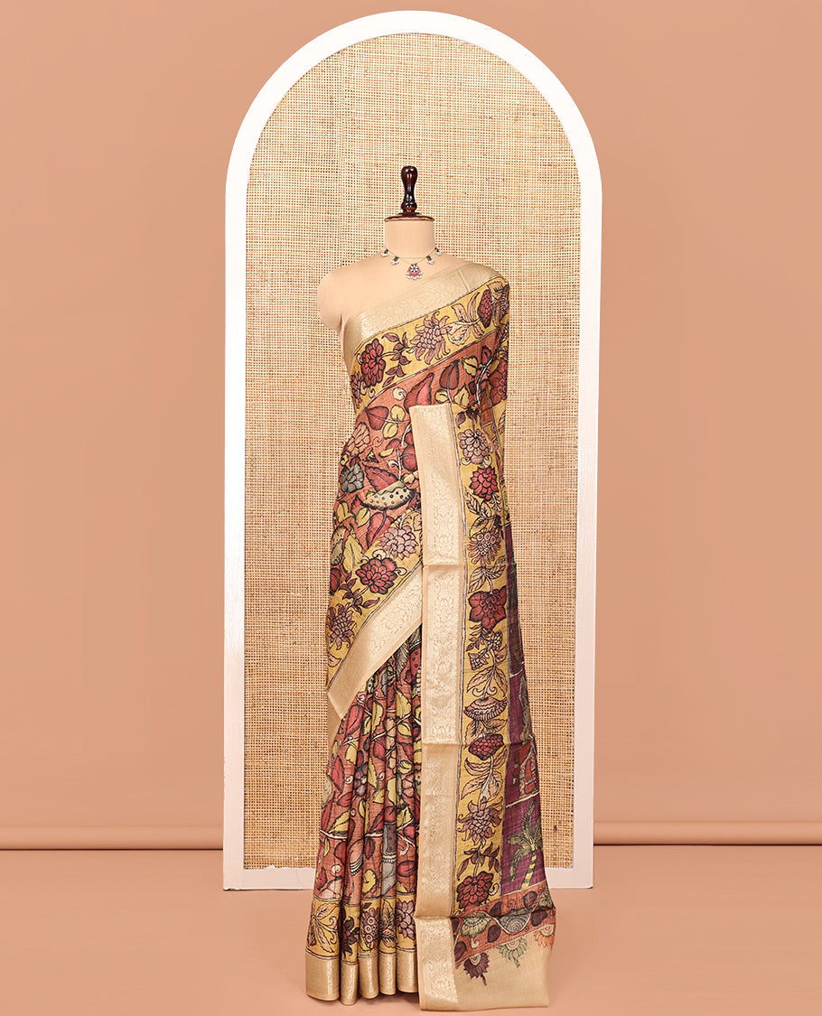 Brown Kalamkari Saree, Embellished with Floral Print, Complemented by Contrast Zari Border, Pallu of Human Figurines Print, and a Contrast Blouse