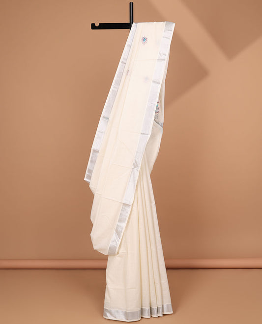 Cream peacock feather embroidered motifs kerala saree,zari border &  floral creeper & peacock feather embroidered pallu
