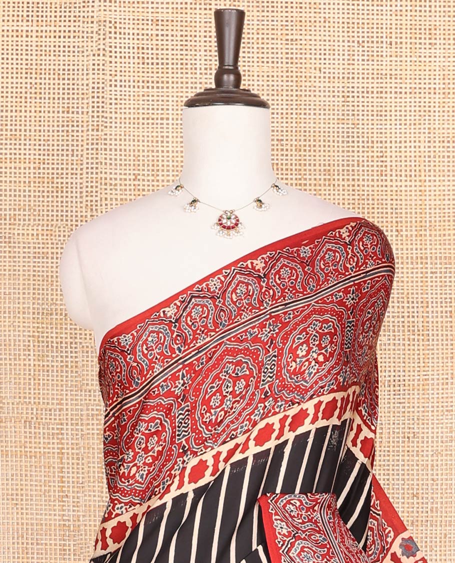 Black striped modal saree with contrast floral design & ajrak floral design pallu