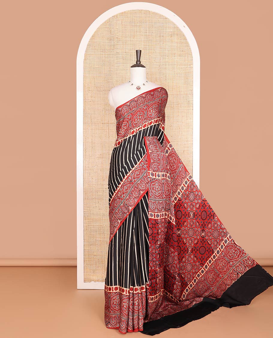 Black striped modal saree with contrast floral design & ajrak floral design pallu