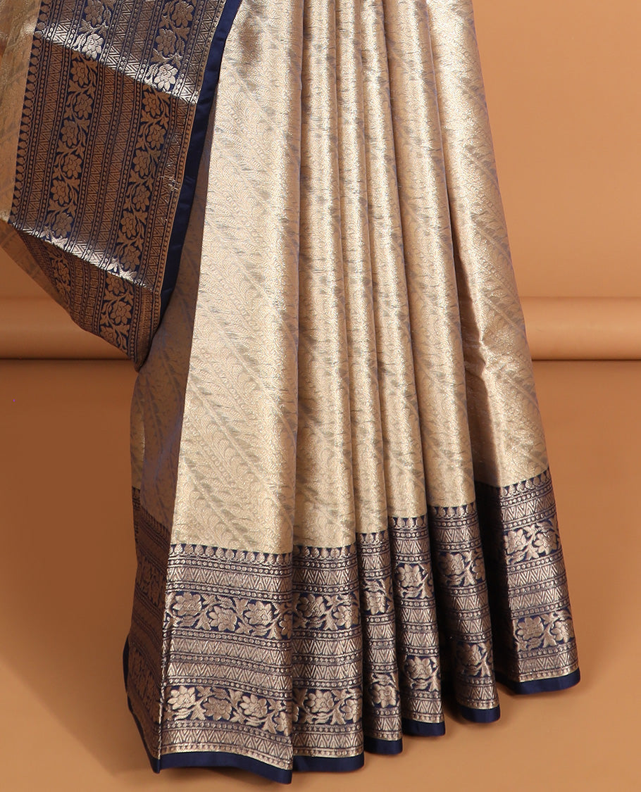 Grey striped floral semi tissue saree with contrast floral design border & zari design pallu