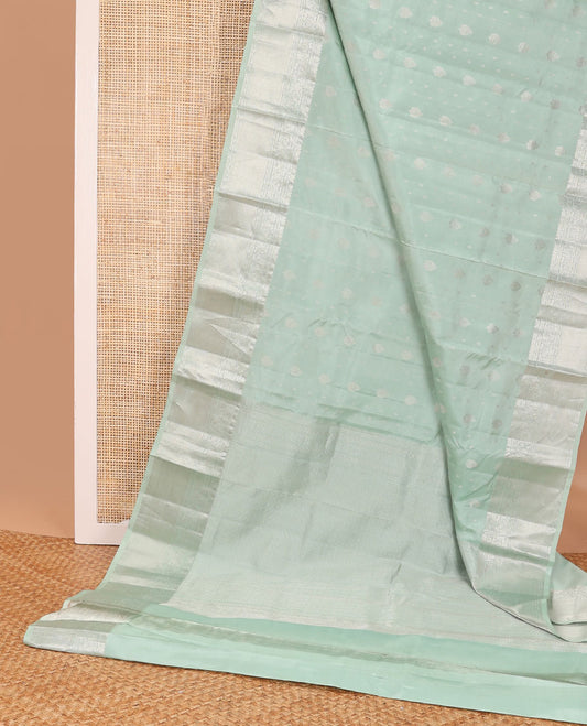 Mint green buttas silk saree with self intricate zari design border & jaal design pallu