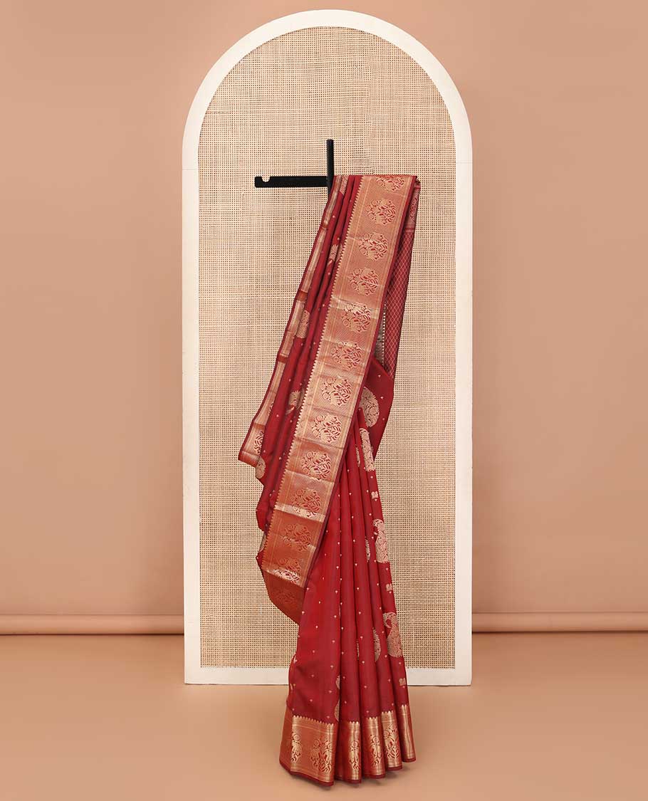 Maroon zari buttas silk saree, zari border of thilakam mokku, muthu, kathir, ara maadam, and yaanai, and jaal pallu