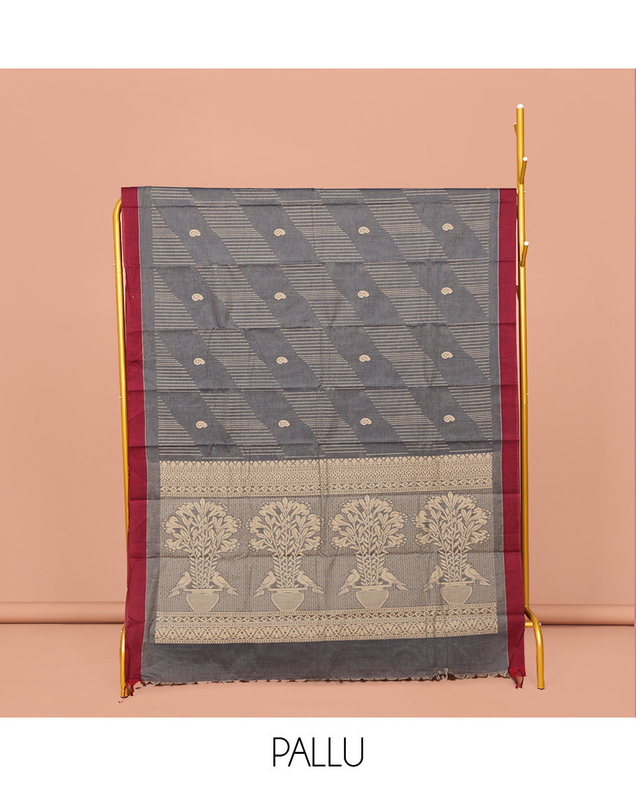 Grey Kanchi Cotton Saree, Subtly Woven with Paisleys and Stripes All Over Its Body, Complemented by Contrast Border, Pallu of Flower Pot Designs and Paired with a Matching Blouse
