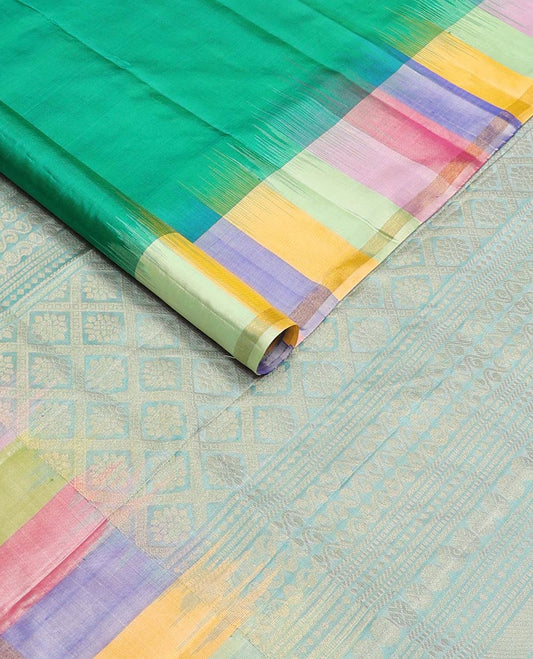 Green zari buttas soft silk saree, contrast multi-colored striped border, and jaal pallu