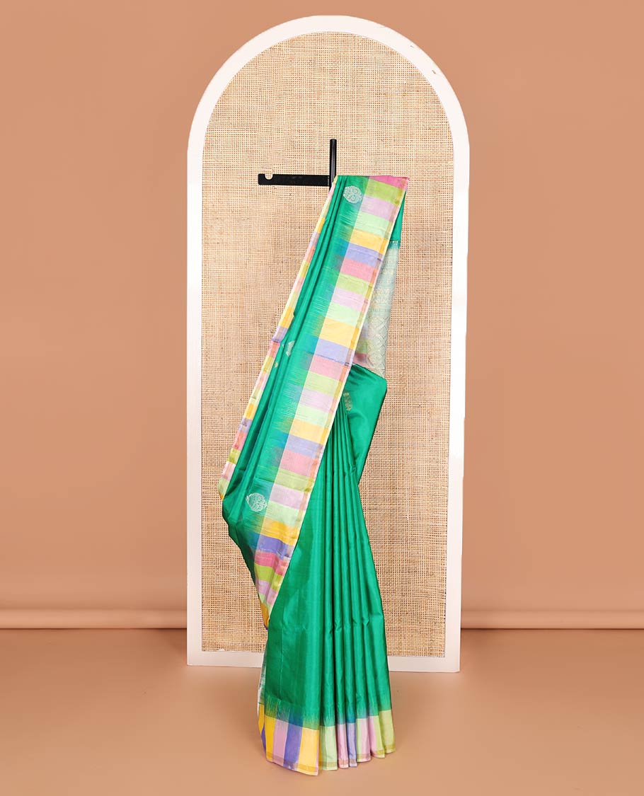 Green zari buttas soft silk saree, contrast multi-colored striped border, and jaal pallu
