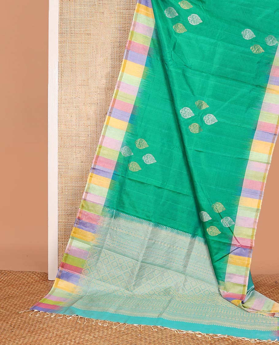 Green zari buttas soft silk saree, contrast multi-colored striped border, and jaal pallu