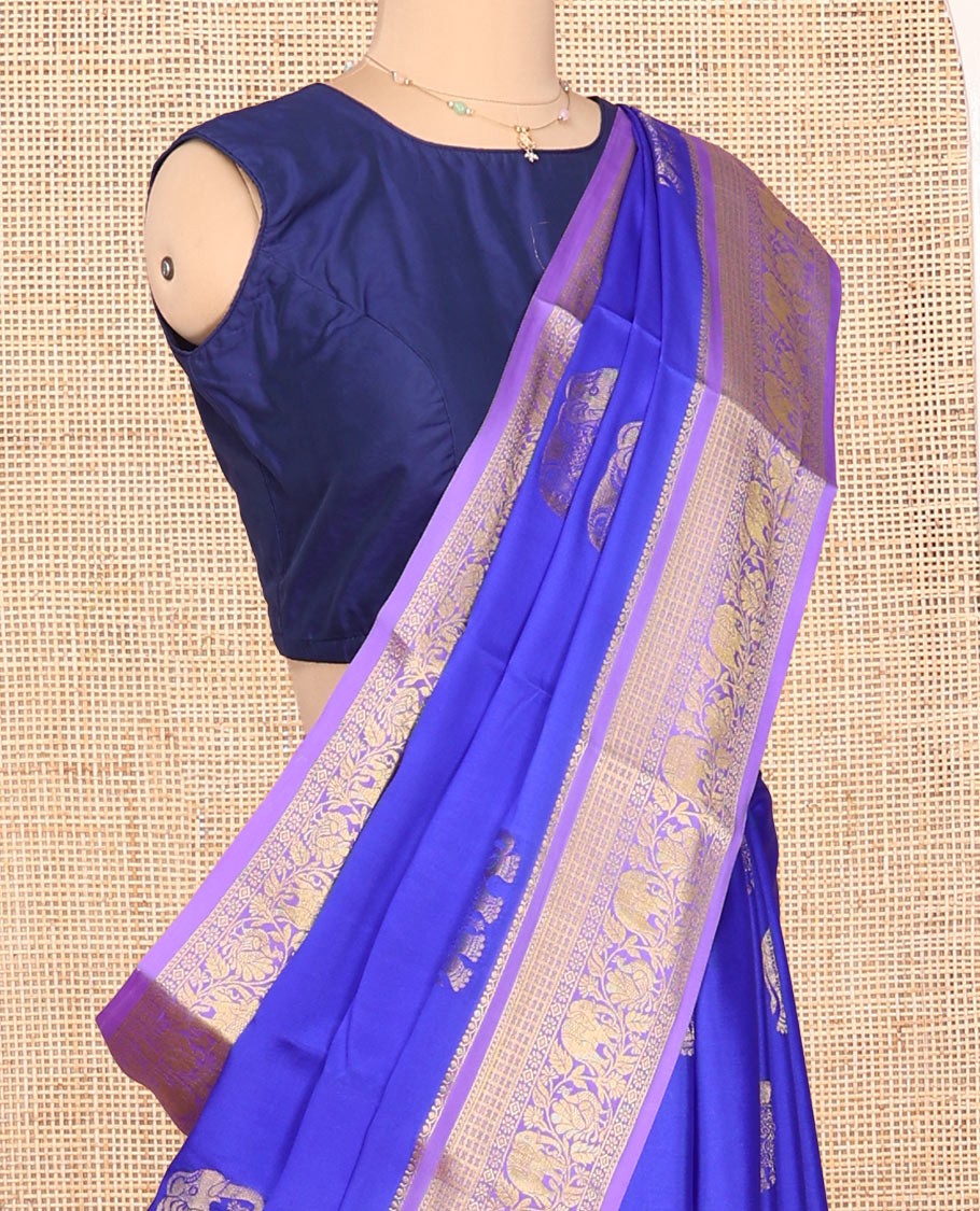 Blue Mysore Silk Saree, Mesmerized with Elephant Buttas Across Its Body, Complemented by Contrast Traditional Zari Border of Peacock-Elephant Designs, Intricately Designed Pallu, and Paired with a Contrast Blouse
