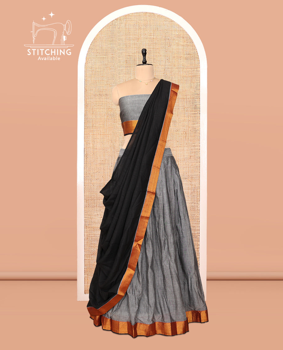 Grey Cotton Half-Saree Features Plain Skirt, a Contrast Zari Border, a Matching Blouse, and a Contrast Dhavani