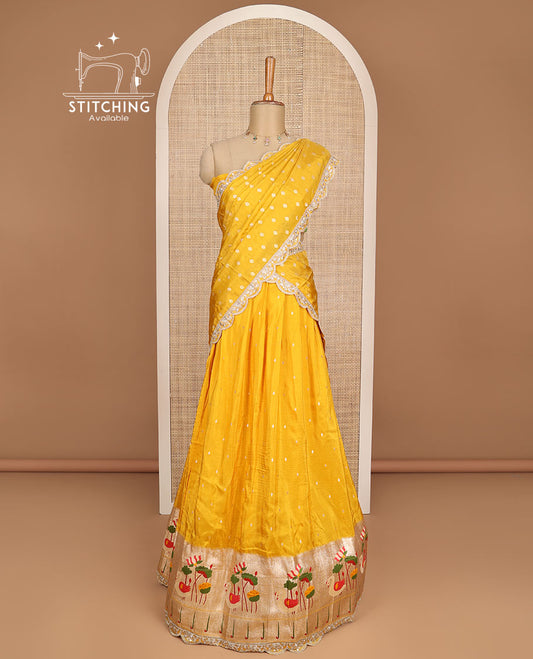 Yellow animal zari design half saree with contrast animal design border, zari design blouse & floral embroidery dhavani