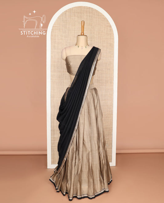 Light brown cotton saree with contrast temple border, zari design blouse, zari design border dhavani