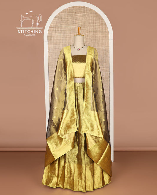 Gold color floral buttas tissue half saree with contrast zari design border, floral design blouse & floral design dhavani