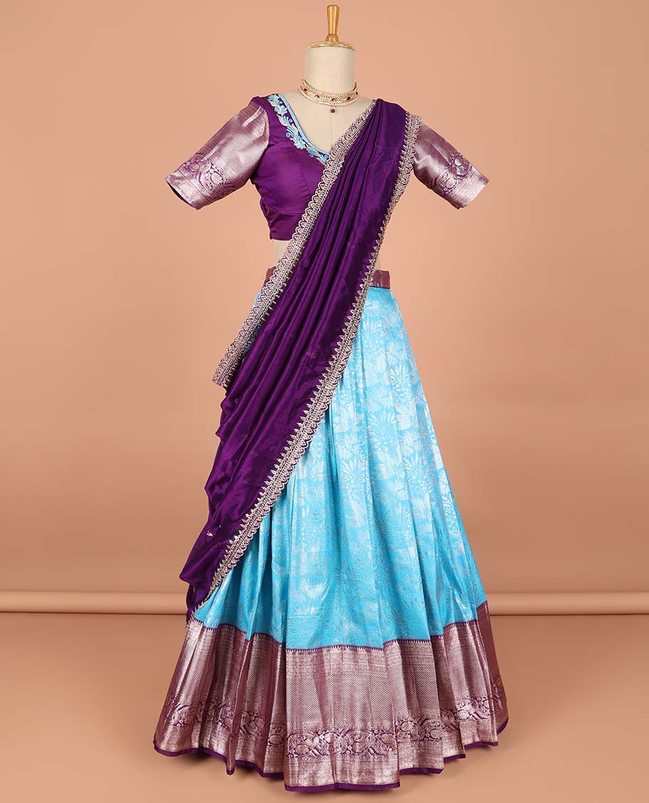 Blue floral jacquard semi-stitched half saree with contrast zari border,  embroidered blouse & scallop border dhavani