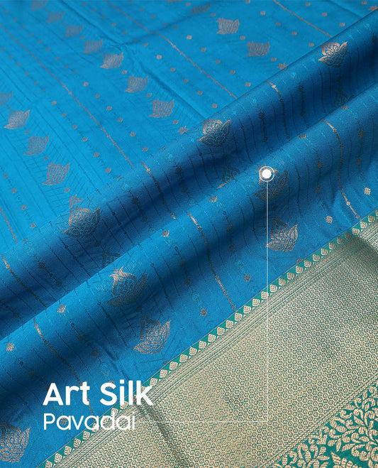 Blue art silk pavadai material, zari buttas with contrast traditional zari bordered skirt, and a contrast bordered blouse