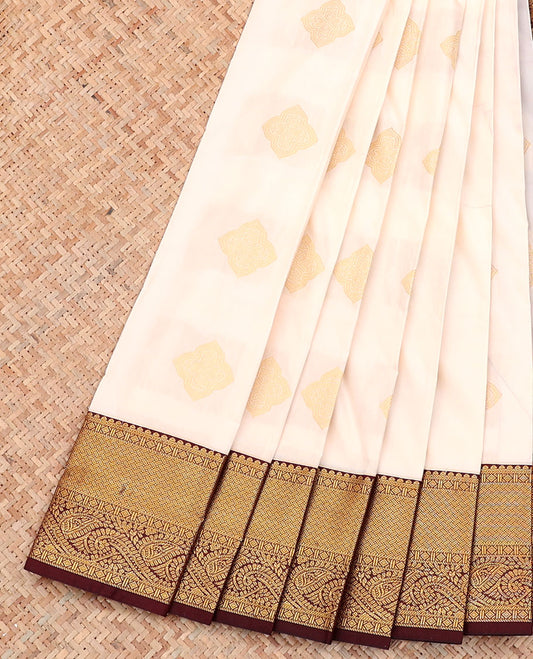 White Budget Silk Saree, Spotlighted with Zari Buttas on Its Body, Complemented by a Contrast Traditional Zari Design Border, Grand Pallu, and Paired with a Contrast Blouse