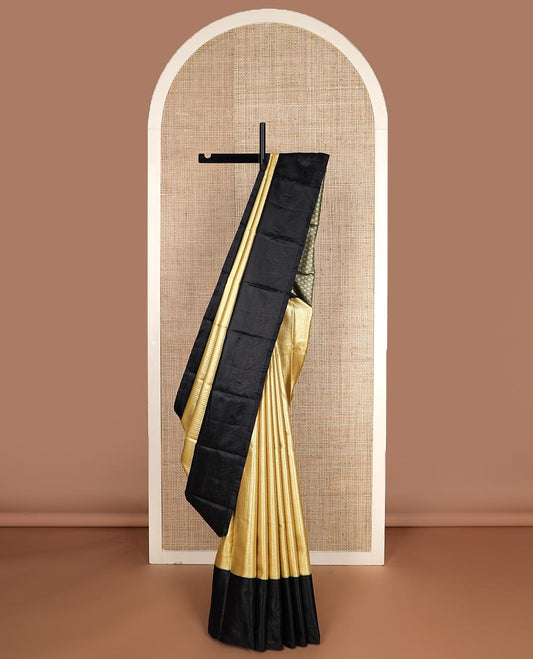 Yellow micro checked style woven budget silk saree, contrast black thread woven border of traditional motifs, and jaal pallu