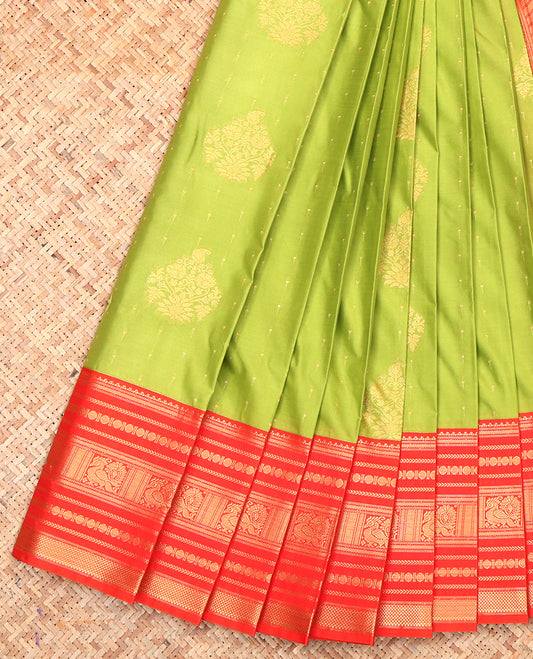 Green Budget Silk Saree, Embellished with Zari Buttas, a Contrast Traditional Zari Border, Grand Pallu, and a Contrast Blouse