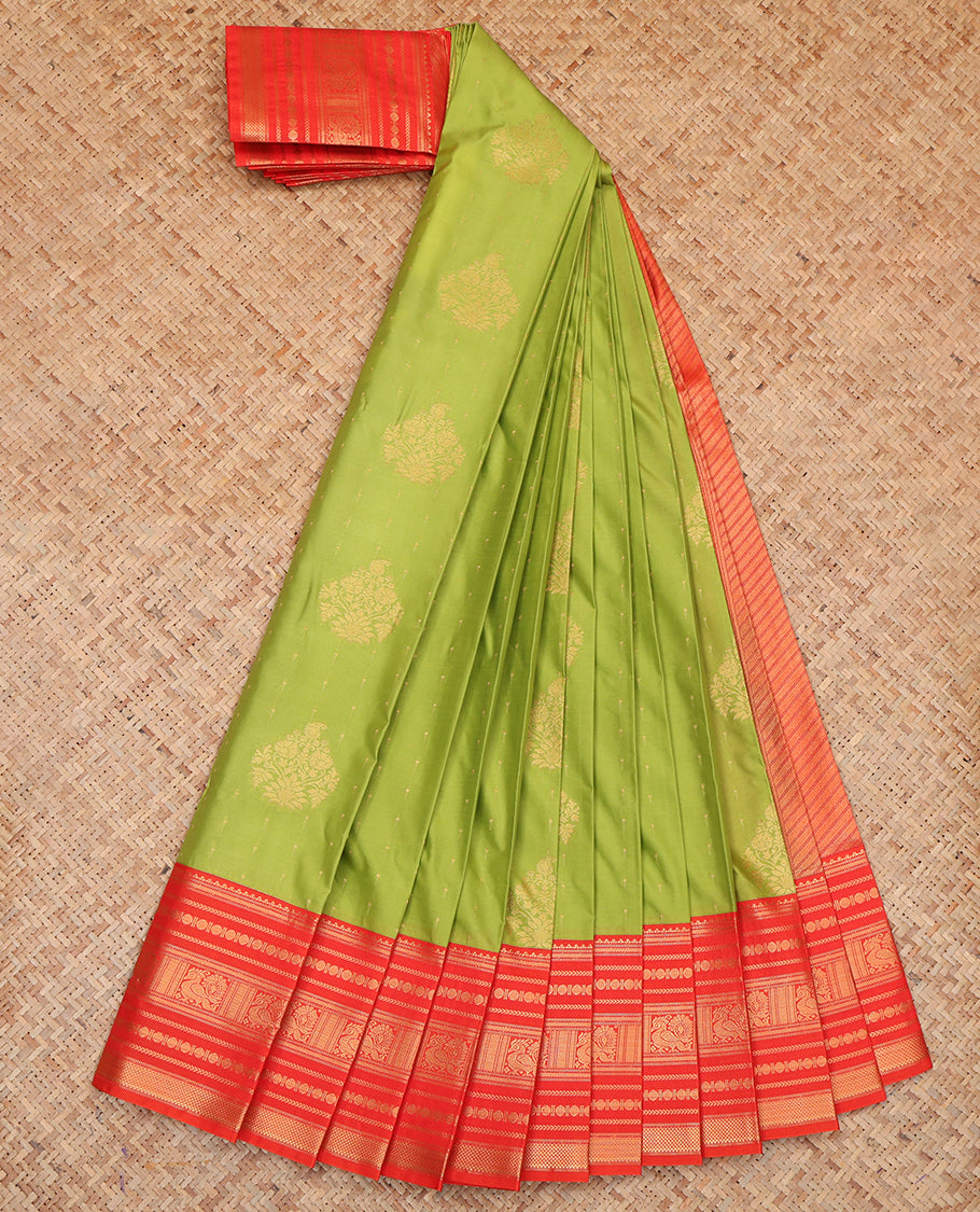 Green Budget Silk Saree, Embellished with Zari Buttas, a Contrast Traditional Zari Border, Grand Pallu, and a Contrast Blouse