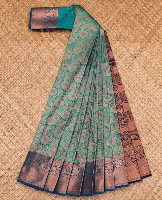 Blue floral jaal jacquard gift saree, contrast zari border, and ogee patterned pallu