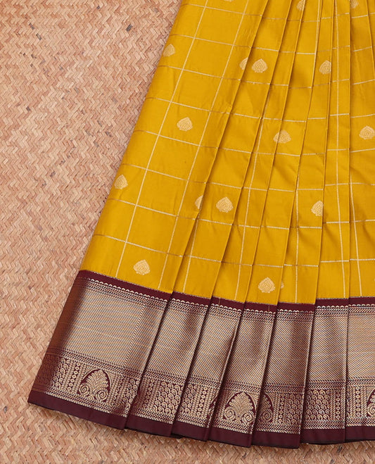 Yellow Budget Silk Saree, Subtly Sparkled with Zari Butta Enclosed Checks, Complemented by a Contrast Traditional Zari Design Border, Grand Pallu, and a Contrast Blouse