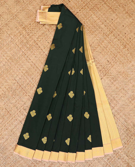 Deep green zari buttas gift saree, contrast peacock zari border, and pallu of geometric patterns