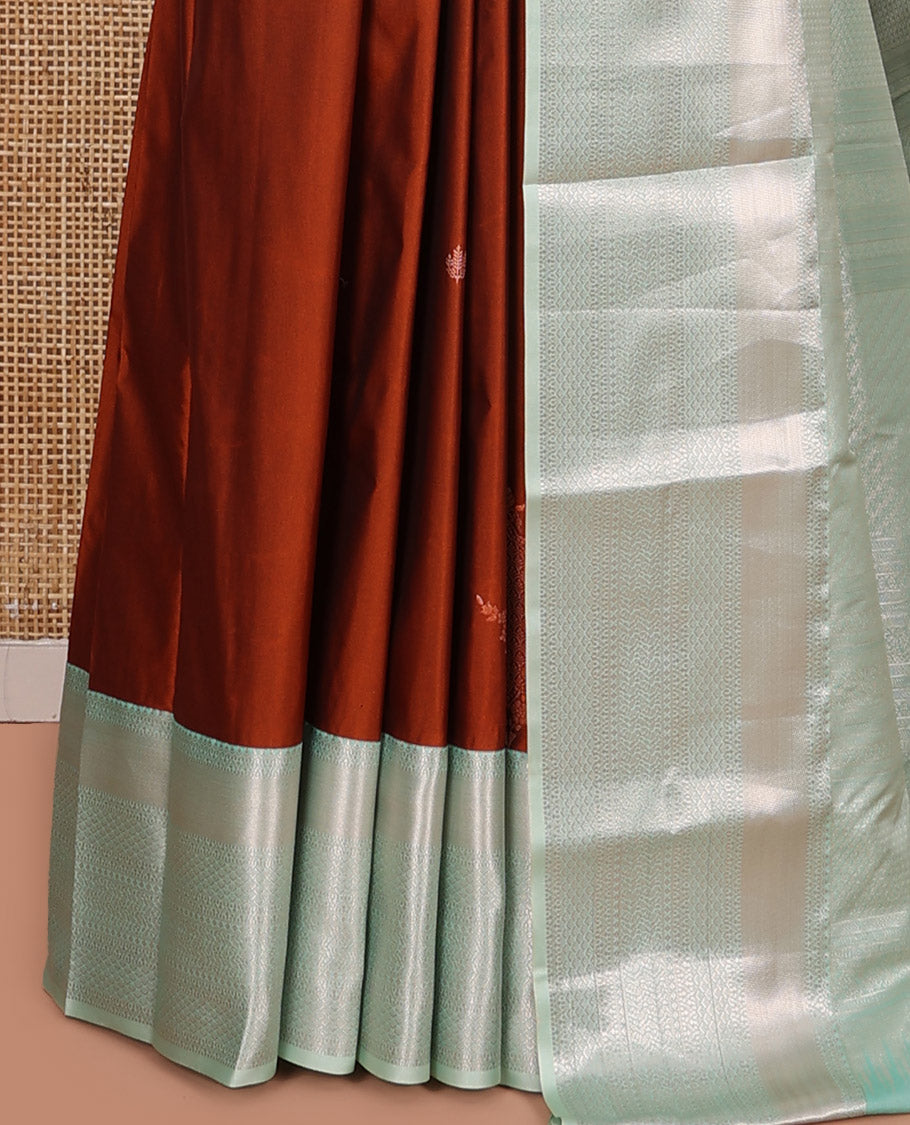Orange Budget Silk Saree, Gleamed Up with Zari Buttas All Over Its Body, Complemented by a Contrast Traditional Zari Designs Woven Border, Elegantly Highlighted Pallu, and Paired with a Contrast Blouse