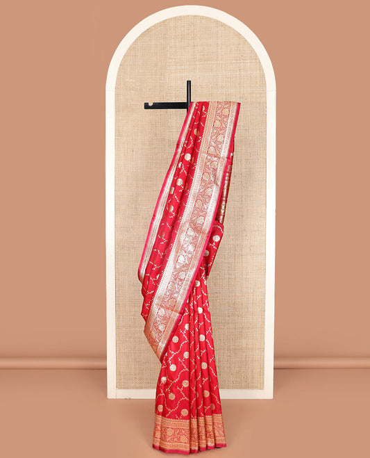 Red floral jaal jacquard banarasi silk saree, floral creeper design border, and intricate ogee patterned pallu