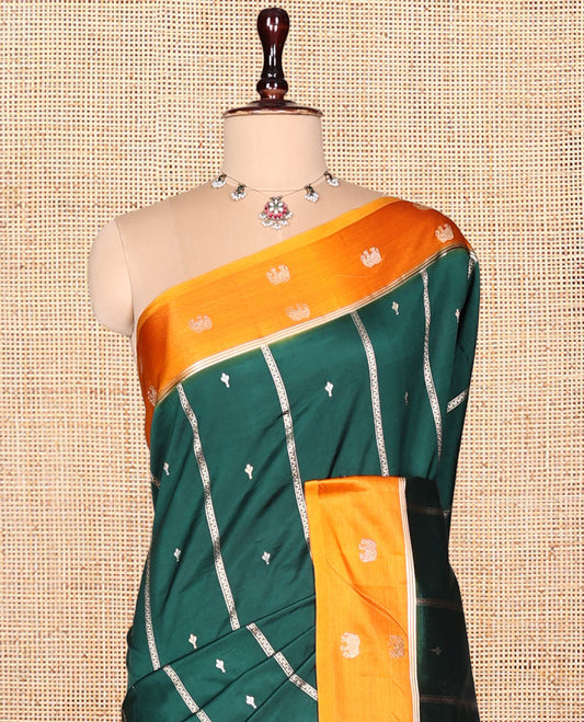 Green Satin Silk Saree, Adorned with Buttas and Stripes, Complemented by a Contrast Elephant Motif Border,  Grand Jaal Pallu, and a Contrast Blouse