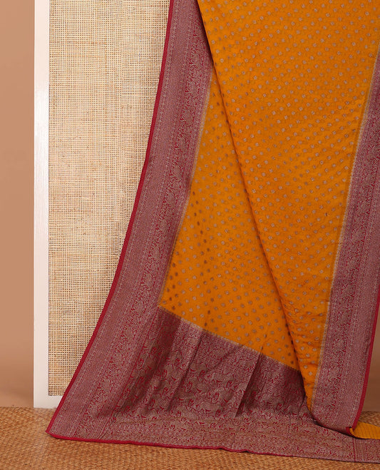 Orange zari buttas fancy crepe saree, contrast traditional zari border & animal motifs woven pallu