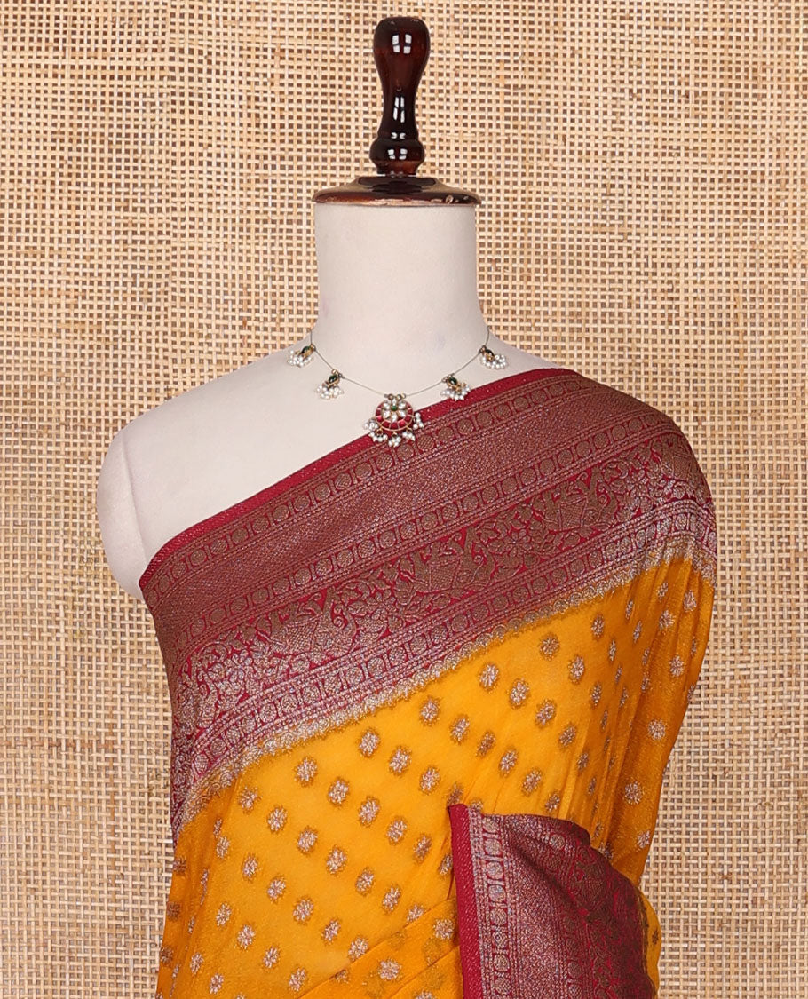 Orange zari buttas fancy crepe saree, contrast traditional zari border & animal motifs woven pallu