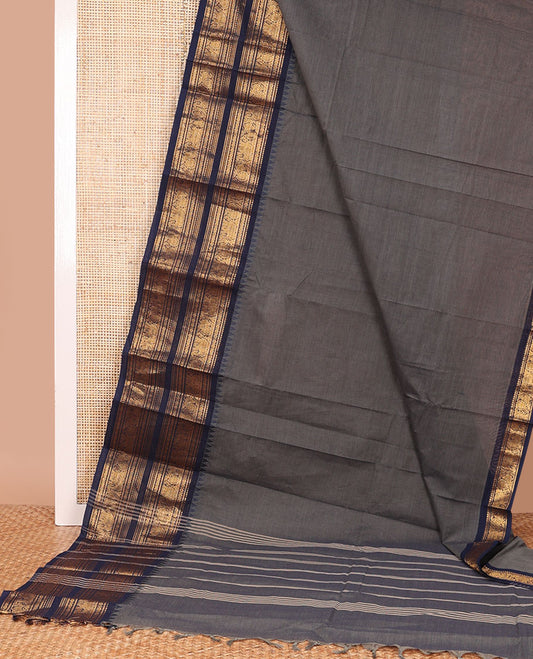 Elephant grey plain Chettinad cotton saree, contrast traditional zari design temple border, and striped pallu