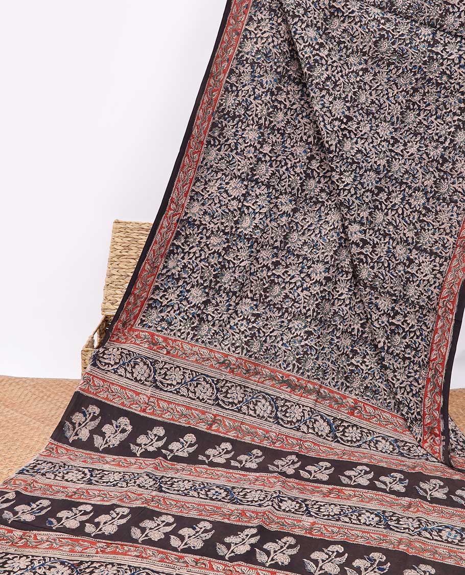 Black floral design machine-printed kalamkari cotton saree with contrast floral border & floral design pallu