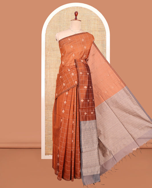 Borderless Rust Semi-Silk Cotton Saree, Elegantly Detailed with Zari Butta Enclosed Checked All Over Its Body, Complemented by Contrast Jaal-Patterned Pallu, and Paired with a Contrast Blouse