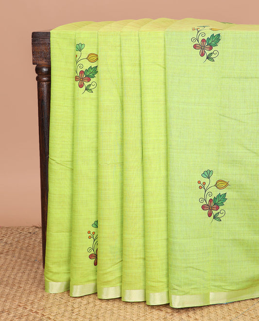 Green kathakali buttas printed chirala cotton saree, bavanji border, and contrast musical motifs print pallu