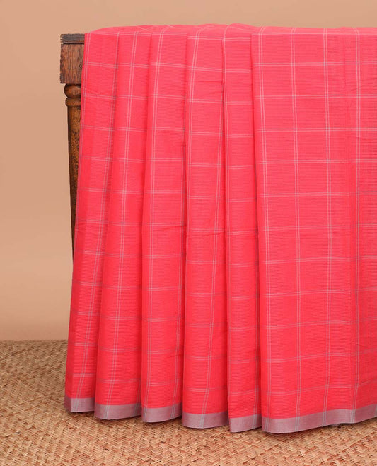 Red checked Mangalagiri cotton saree with contrast striped border, striped pallu, and a contrast kalamkari floral printed blouse