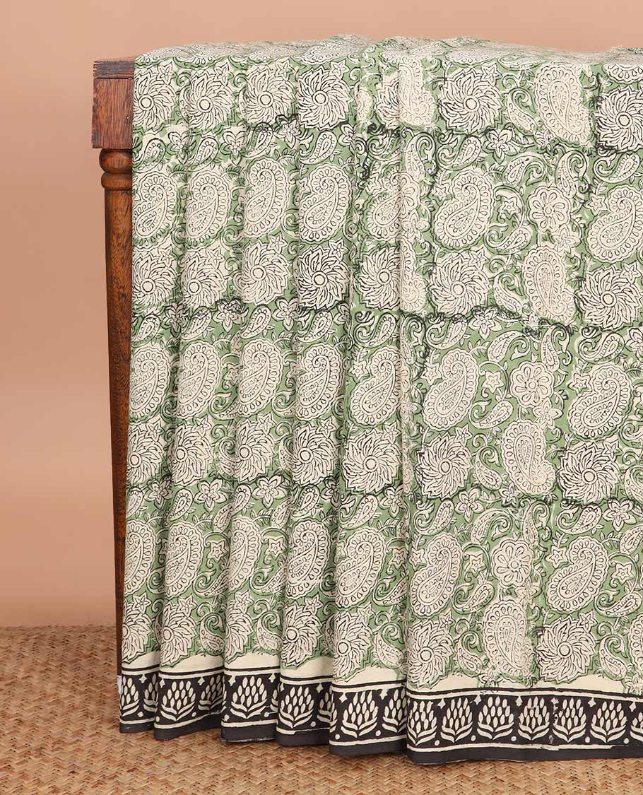 Green paisleys machine-printed Kalamkari cotton saree, contrast printed border, and printed pallu