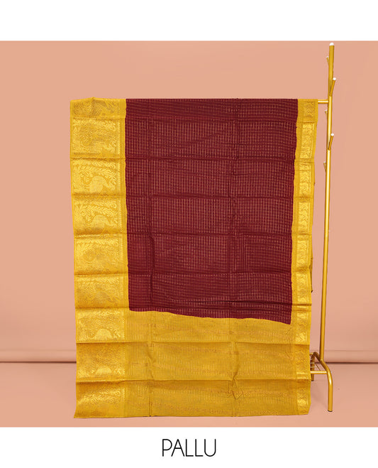 Maroon Sungudi Cotton Saree, Detailed with Zari Checks on Its Body, Complemented by a Contrast Traditional Zari Border of Big Peacocks, Zari-Striped Pallu, and Paired with a Contrast Blouse