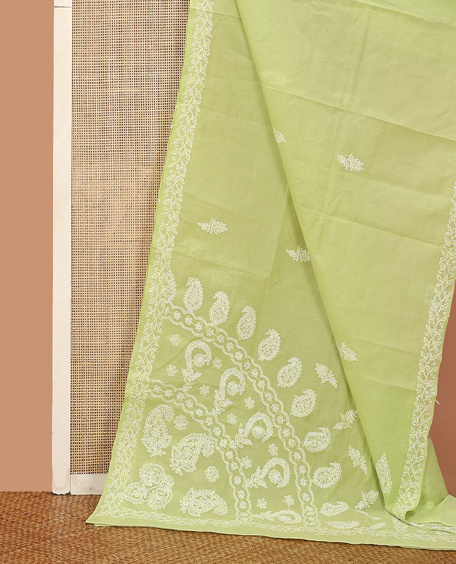 Green floral thread embroidered buttas Lucknowi chikankari saree, floral creeper thread embroidered border, and paisley embroidered pallu