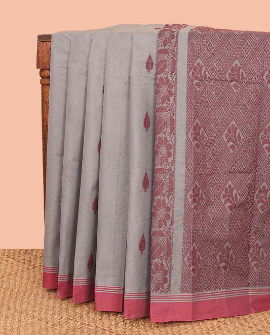 Grey Kanchi Cotton Saree, Detailed with Buttas All Over Its Body, Complemented by Contrast Border, Pallu Adorned with Geometric Design, and Paired with a Matching Blouse
