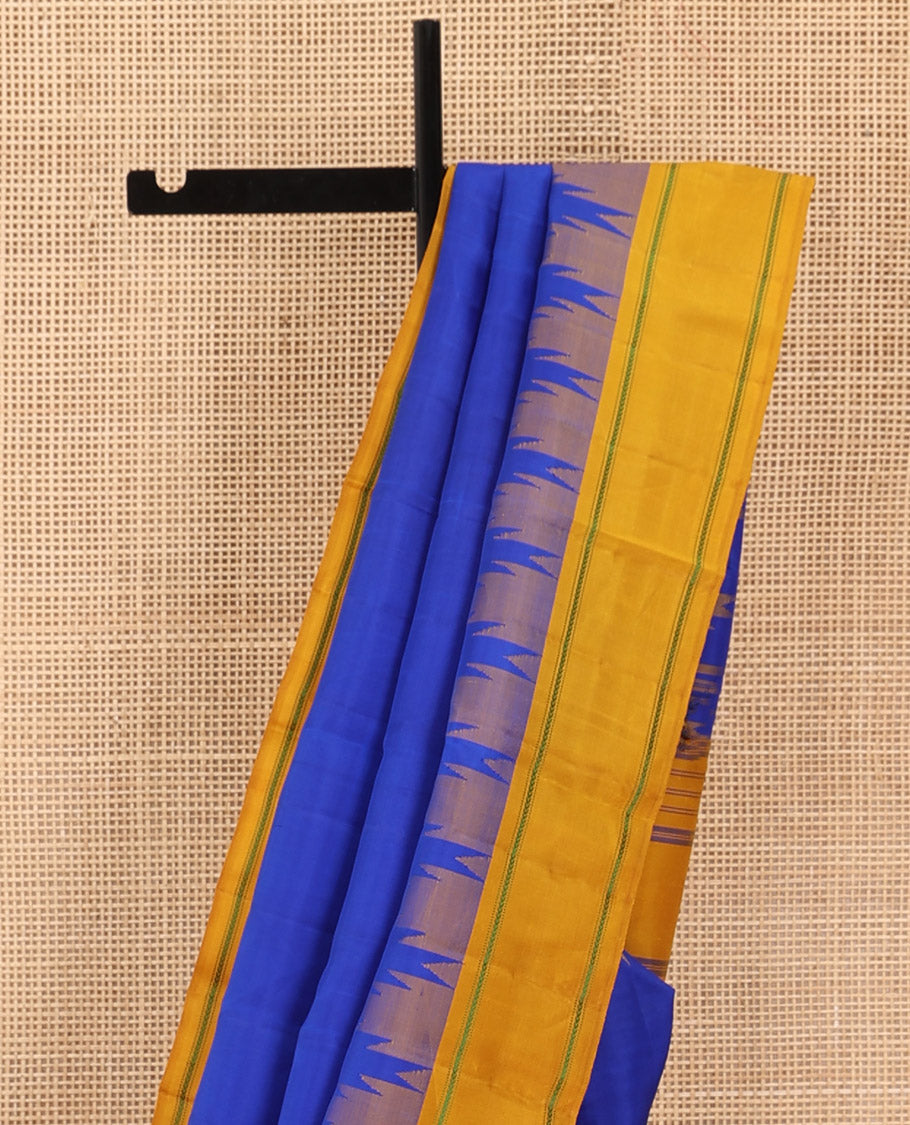 Blue plain kanchipuram silk saree, contrast thazampoo rekku border of muthu, and kathir designs, and pallu of stripes, and thazampoo rekku designs
