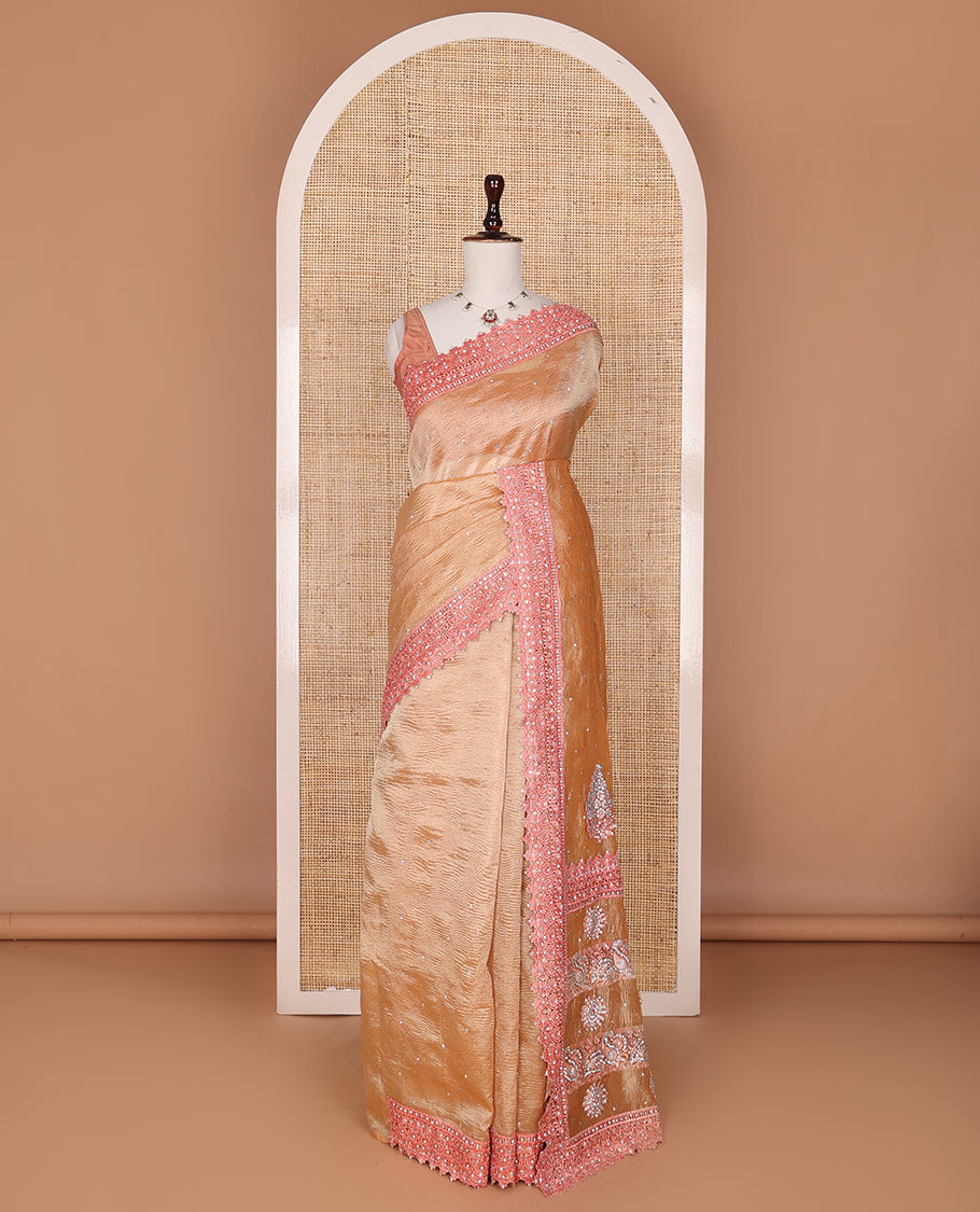 Orange stone embedded crushed tissue designer saree, scallop thread and stone embroidered border