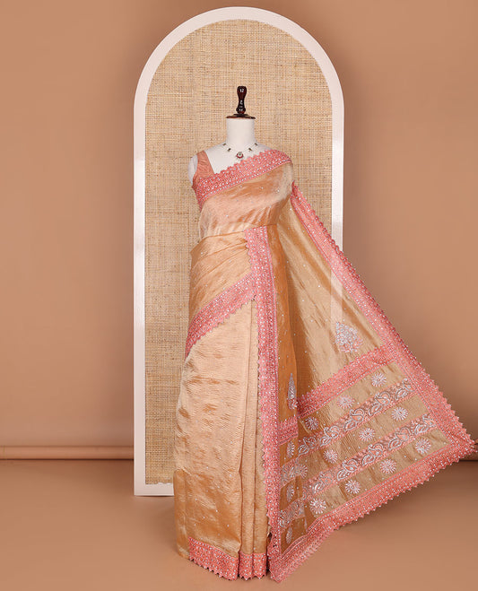 Orange stone embedded crushed tissue designer saree, scallop thread and stone embroidered border
