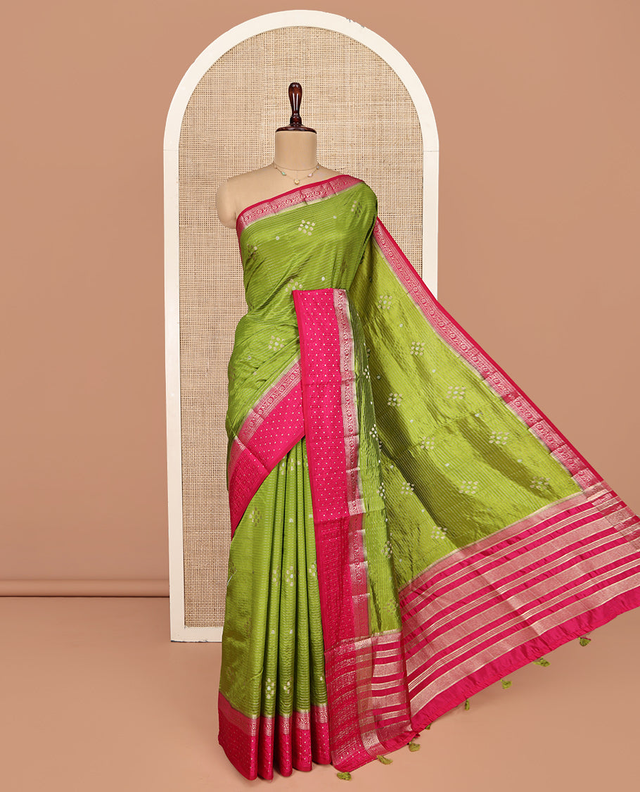 Green Semi-Banaras Dupion Saree, Detailed with Zari Buttas and Stripes, Complemented by Contrast Traditional Border, Zari Striped Pallu, and a Contrast Blouse