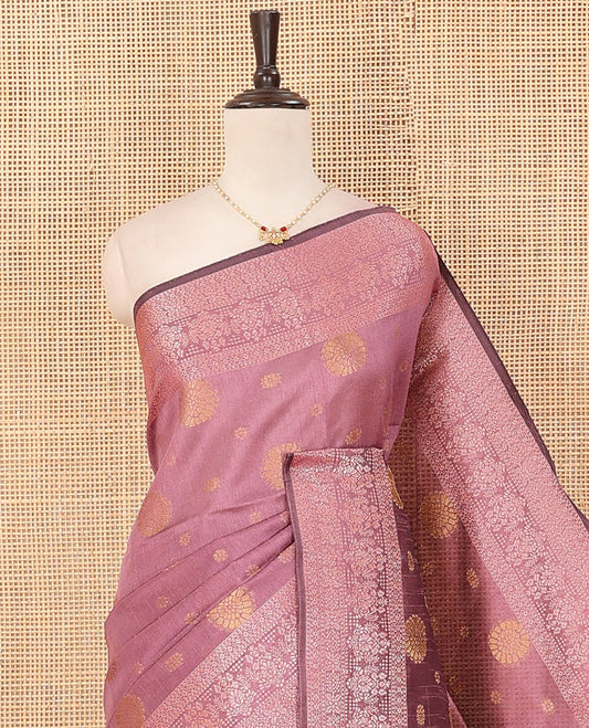 Pink floral buttas dupion saree, intricate motifs border, and pallu of multi-colored thread stripes