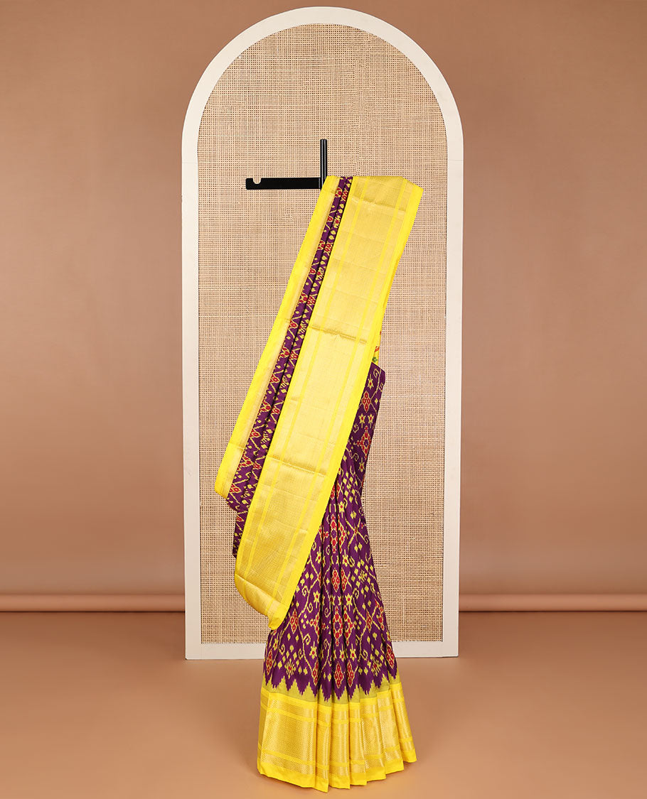 Violet floral design ikkat saree with contrast zari border & geometric design pallu