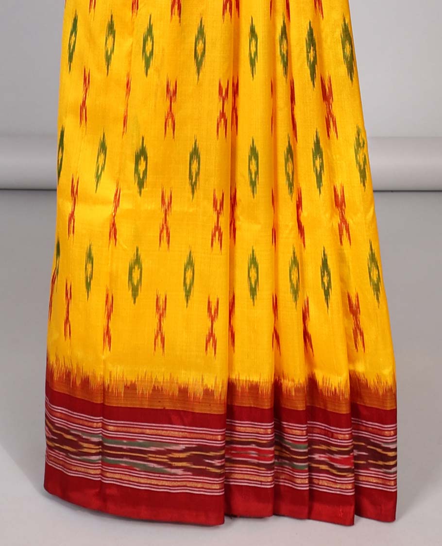 yellow with motifs ikkat silk saree, contrast striped border & striped design pallu