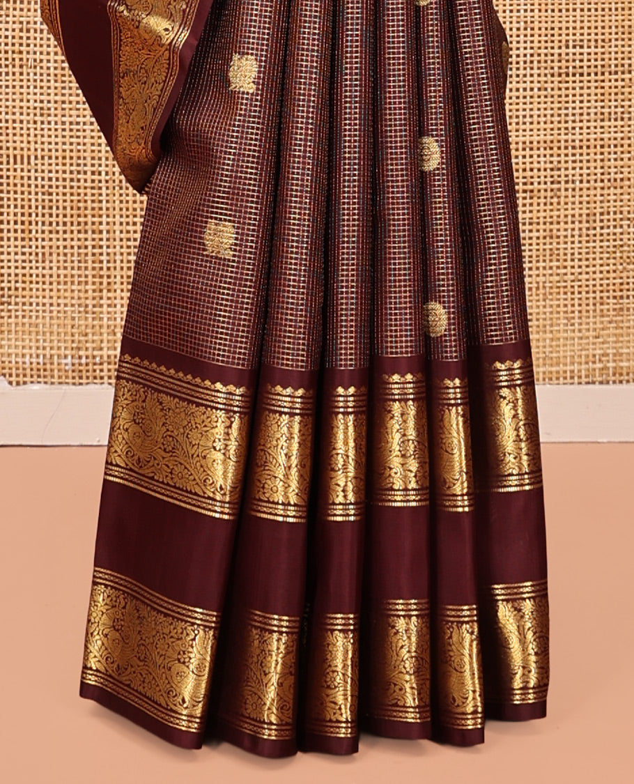 Maroon Kanchipuram Silk Saree, Majestically Detailed with Mayil-Chakra Buttas and Checks, Highlighted by Zari Border of Salngai, and Mayil Designs, Jaal Pallu, and Matching Blouse